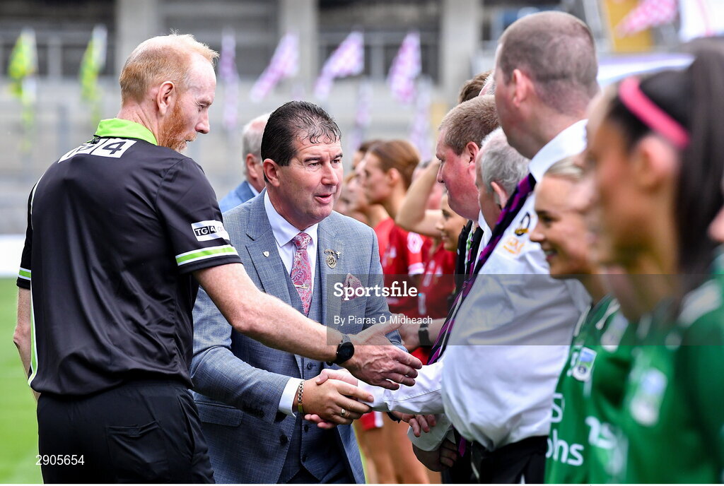 4 August 2024; Uachtarán Cumann Peil Gael na mBan Mícheál Naughton is introduced to the match officials by referee Gerard Canny before the TG4 All-Ireland Ladies Football Junior Championship final match between Fermanagh and Louth at Croke Park in Dublin. Photo by Piaras Ó Mídheach/Sportsfile