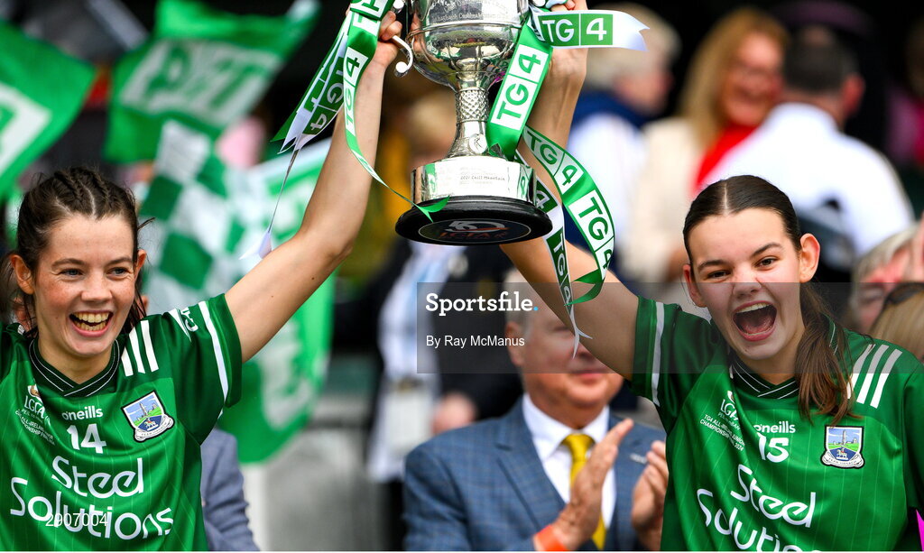 4 August 2024; Fermanagh players Eimear Smyth and Bronagh Smyth lift the West County Hotel cup after the TG4 All-Ireland Ladies Junior Football Championship final match between Fermanagh and Louth at Croke Park, Dublin. Photo by Ray McManus/Sportsfile