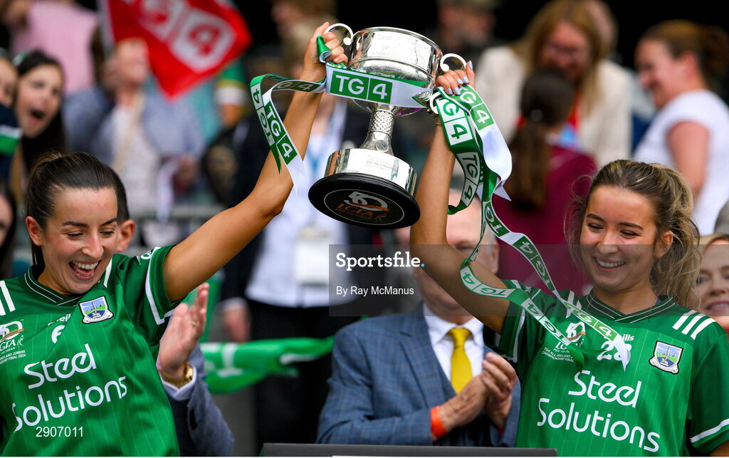 4 August 2024; Courteney Murphy and Kate Murphy of Fermanagh lift the West County Hotel cup after the TG4 All-Ireland Ladies Junior Football Championship final match between Fermanagh and Louth at Croke Park, Dublin. Photo by Ray McManus/Sportsfile