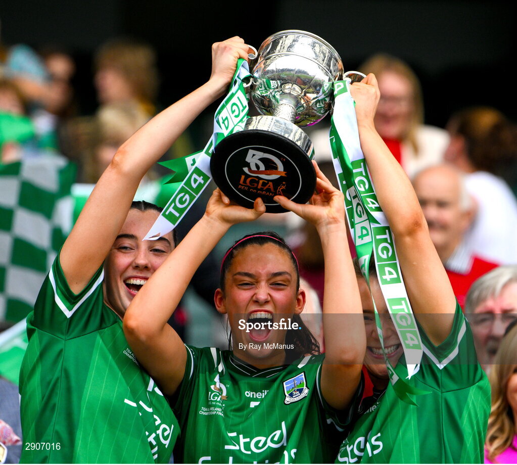 4 August 2024; Bláithín Bogue, Cadhla-Cara Bogue and Shannan McQuade of Fermanagh lift the West County Hotel cup after the TG4 All-Ireland Ladies Junior Football Championship final match between Fermanagh and Louth at Croke Park, Dublin. Photo by Ray McManus/Sportsfile