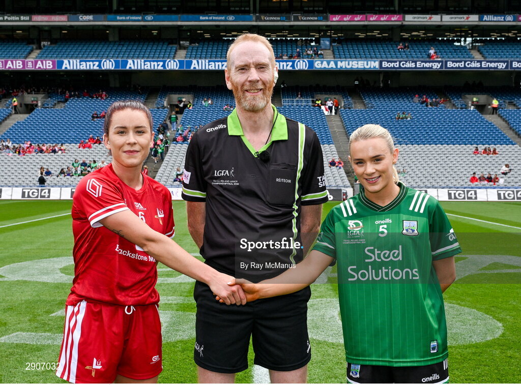 4 August 2024; Referee Ger Canny with the two captains, Áine Breen of Louth and Shannan McQuade of Fermanagh, before the TG4 All-Ireland Ladies Junior Football Championship final match between Fermanagh and Louth at Croke Park, Dublin. Photo by Ray McManus/Sportsfile