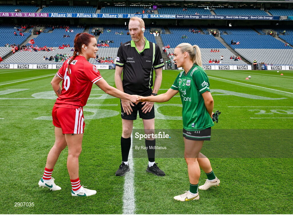 4 August 2024; Referee Ger Canny with the two captains, Áine Breen of Louth and Shannan McQuade of Fermanagh, before the TG4 All-Ireland Ladies Junior Football Championship final match between Fermanagh and Louth at Croke Park, Dublin. Photo by Ray McManus/Sportsfile