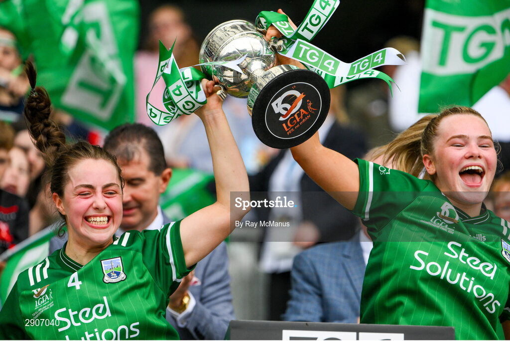 4 August 2024; Eimear Keenan and Niamh McManus of Fermanagh lift the West County Hotel cup after the TG4 All-Ireland Ladies Junior Football Championship final match between Fermanagh and Louth at Croke Park, Dublin. Photo by Ray McManus/Sportsfile