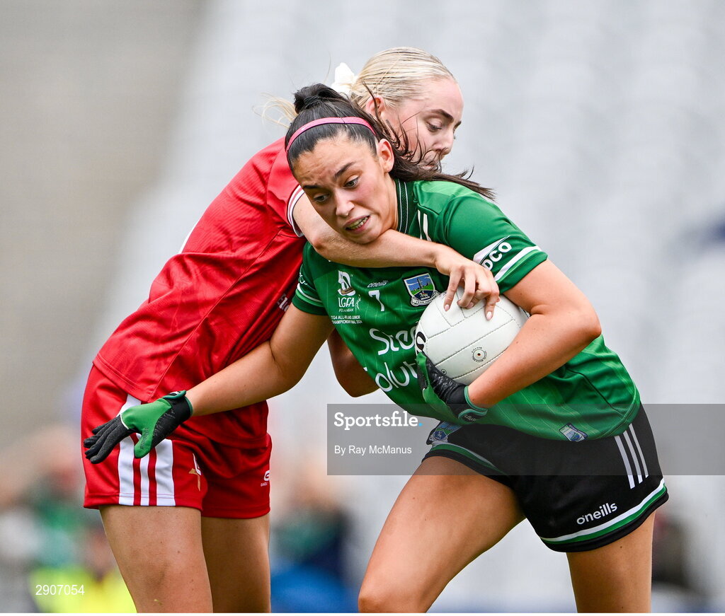 4 August 2024; Cadhla-Cara Bogue of Fermanagh is tackled by Aoife Russell of Louth during the TG4 All-Ireland Ladies Junior Football Championship final match between Fermanagh and Louth at Croke Park, Dublin. Photo by Ray McManus/Sportsfile