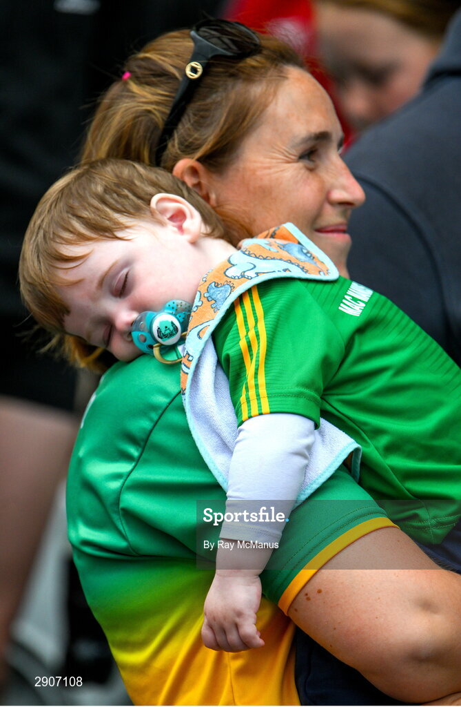 4 August 2024; A young Leitrim supporter relaxes during the cup presentation at the TG4 All-Ireland Ladies Football Intermediate Championship final match between Leitrim and Tyrone at Croke Park, Dublin. Photo by Ray McManus/Sportsfile