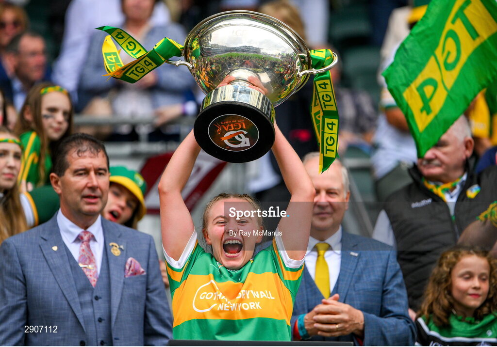4 August 2024; Síomha Quinn of Leitrim lifts the Mary Quinn Memorial cup after the TG4 All-Ireland Ladies Football Intermediate Championship final match between Leitrim and Tyrone at Croke Park, Dublin. Photo by Ray McManus/Sportsfile