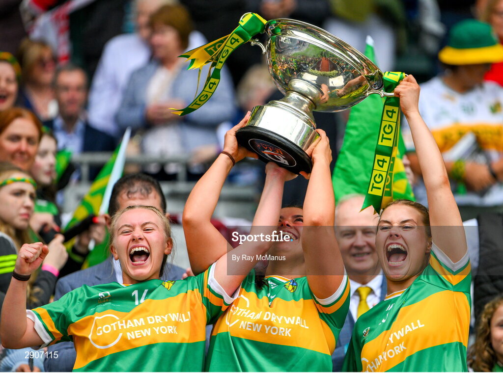 4 August 2024; Leitrim players Síomha Quinn, Éimhín Quinn and Edel Shanley lift the Mary Quinn Memorial cup after the TG4 All-Ireland Ladies Football Intermediate Championship final match between Leitrim and Tyrone at Croke Park, Dublin. Photo by Ray McManus/Sportsfile