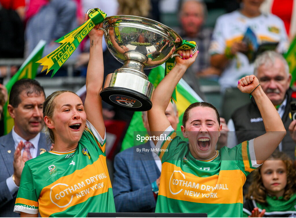 4 August 2024; Leitrim players Clare Owens and Brónagh O'Rourke lift the Mary Quinn Memorial cup after the TG4 All-Ireland Ladies Football Intermediate Championship final match between Leitrim and Tyrone at Croke Park, Dublin. Photo by Ray McManus/Sportsfile