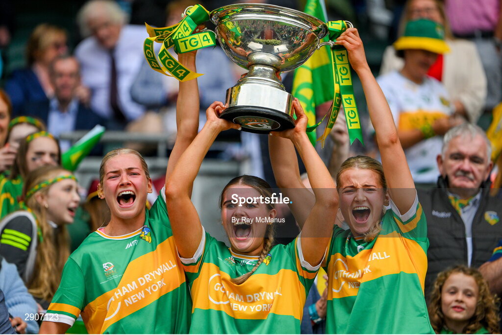 4 August 2024; Leitrim players Elise Bruen, Sarah Reynolds and Kasey Bruen lift the Mary Quinn Memorial cup after the TG4 All-Ireland Ladies Football Intermediate Championship final match between Leitrim and Tyrone at Croke Park, Dublin. Photo by Ray McManus/Sportsfile