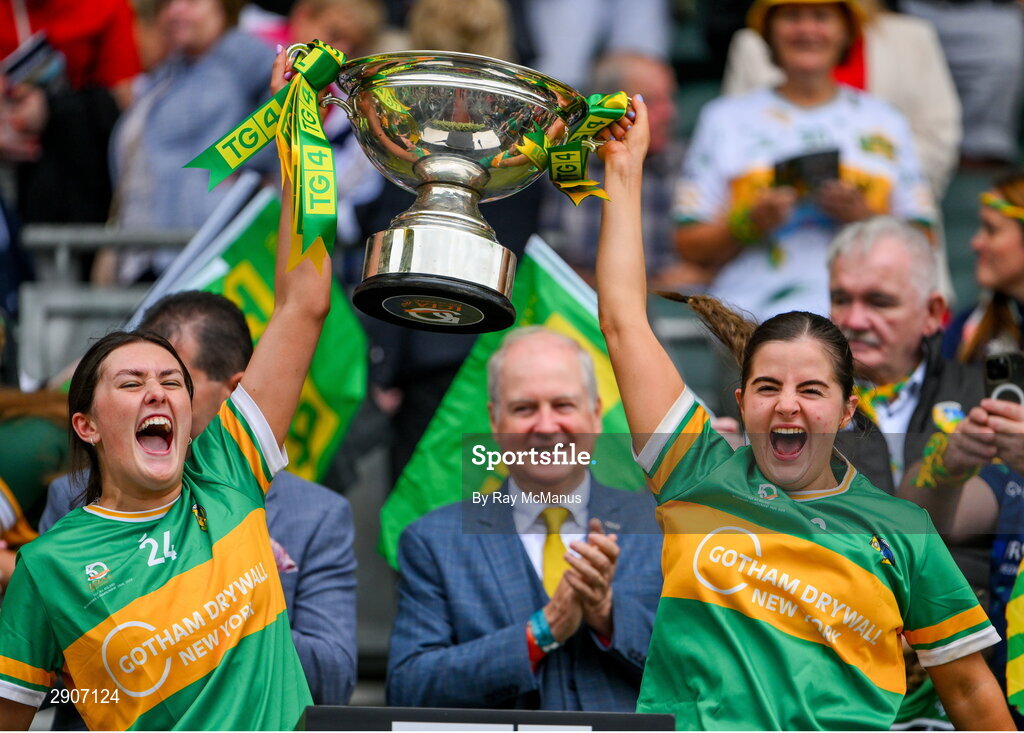 4 August 2024; Leitrim players Vivienne Egan and Eimear Quigley lift the Mary Quinn Memorial cup after the TG4 All-Ireland Ladies Football Intermediate Championship final match between Leitrim and Tyrone at Croke Park, Dublin. Photo by Ray McManus/Sportsfile