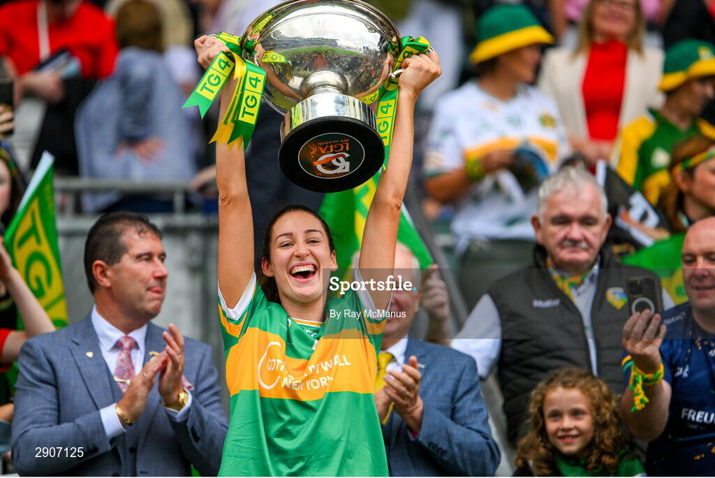 4 August 2024; Orla Flynn of Leitrim lifts the Mary Quinn Memorial cup after the TG4 All-Ireland Ladies Football Intermediate Championship final match between Leitrim and Tyrone at Croke Park, Dublin. Photo by Ray McManus/Sportsfile