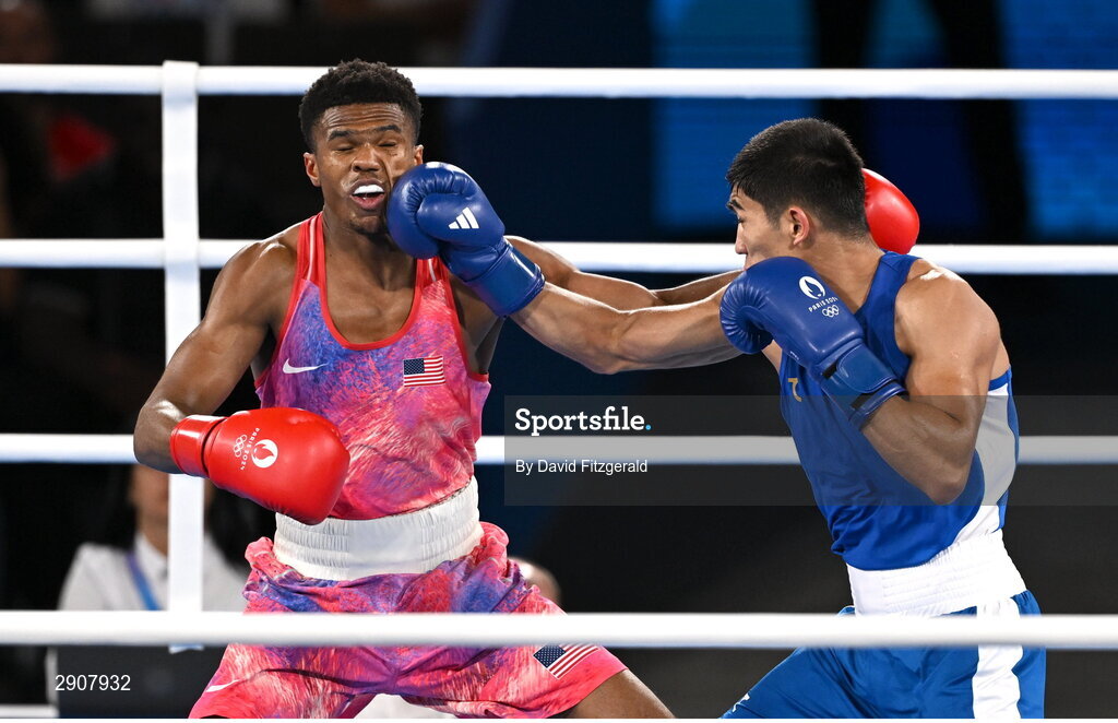 6 August 2024; Omari Jones of Team United States, left, and Asadkhuja Muydinkhujaev of Team Uzbekistan during their men's 71kg semi-final bout at Court Philippe-Chatrier in Roland Garros Stadium during the 2024 Paris Summer Olympic Games in Paris, France. Photo by David Fitzgerald/Sportsfile