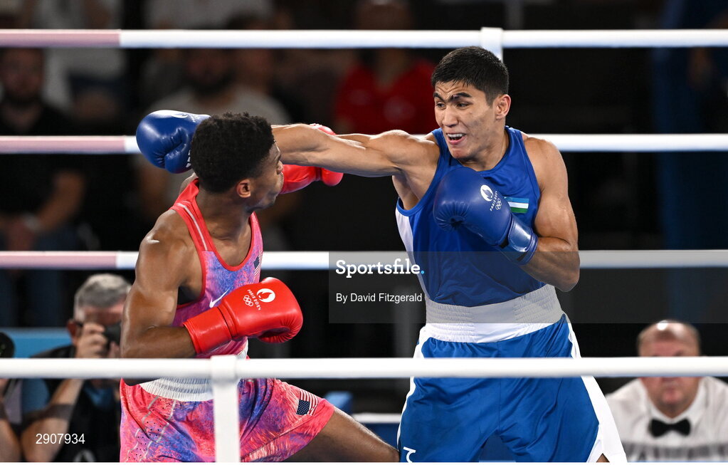 6 August 2024; Omari Jones of Team United States, left, and Asadkhuja Muydinkhujaev of Team Uzbekistan during their men's 71kg semi-final bout at Court Philippe-Chatrier in Roland Garros Stadium during the 2024 Paris Summer Olympic Games in Paris, France. Photo by David Fitzgerald/Sportsfile