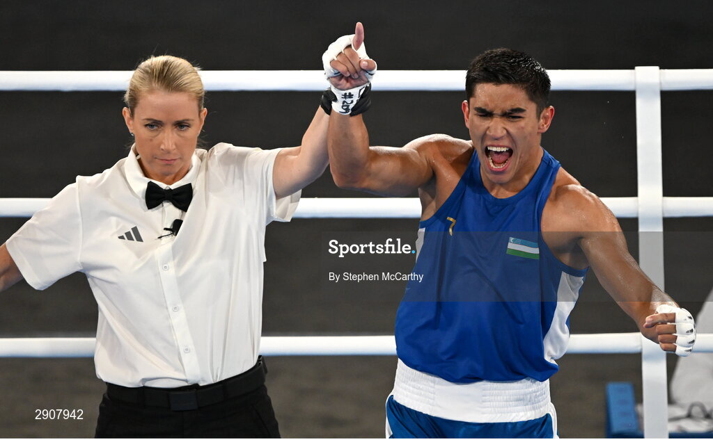6 August 2024; Asadkhuja Muydinkhujaev of Team Uzbekistan celebrates defeating Omari Jones of Team United States in their men's 71kg semi-final bout at Court Philippe-Chatrier in Roland Garros Stadium during the 2024 Paris Summer Olympic Games in Paris, France. Photo by Stephen McCarthy/Sportsfile