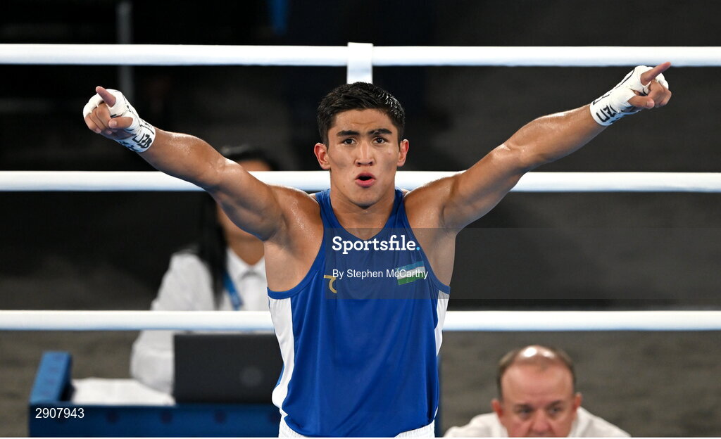 6 August 2024; Asadkhuja Muydinkhujaev of Team Uzbekistan celebrates defeating Omari Jones of Team United States in their men's 71kg semi-final bout at Court Philippe-Chatrier in Roland Garros Stadium during the 2024 Paris Summer Olympic Games in Paris, France. Photo by Stephen McCarthy/Sportsfile