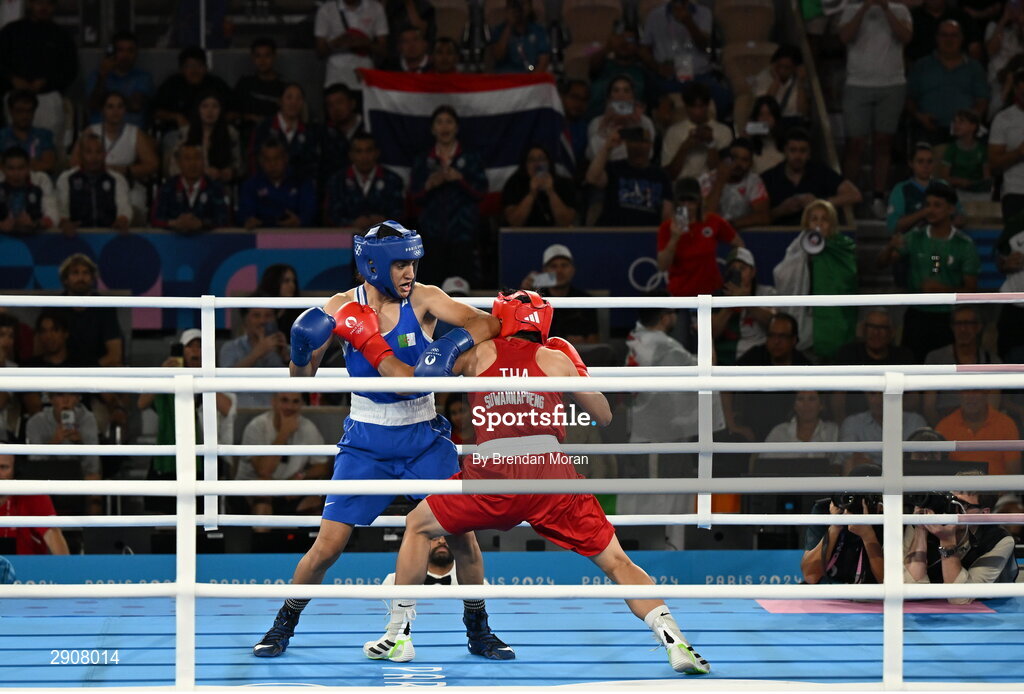 6 August 2024; Imane Khelif of Team Algeria, left, and Janjaem Suwannapheng of Team Thailand during their women's 66kg semi-final bout at Court Philippe-Chatrier in Roland Garros Stadium during the 2024 Paris Summer Olympic Games in Paris, France. Photo by Brendan Moran/Sportsfile