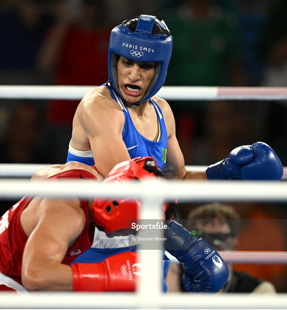 6 August 2024; Imane Khelif of Team Algeria, above, and Janjaem Suwannapheng of Team Thailand during their women's 66kg semi-final bout at Court Philippe-Chatrier in Roland Garros Stadium during the 2024 Paris Summer Olympic Games in Paris, France. Photo by Brendan Moran/Sportsfile
