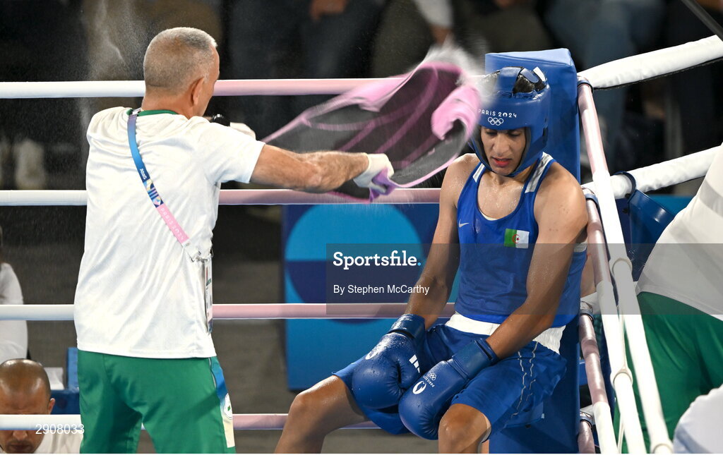 6 August 2024; Imane Khelif of Team Algeria is cooled down in the corner during her women's 66kg semi-final bout against Janjaem Suwannapheng of Team Thailand at Court Philippe-Chatrier in Roland Garros Stadium during the 2024 Paris Summer Olympic Games in Paris, France. Photo by Stephen McCarthy/Sportsfile