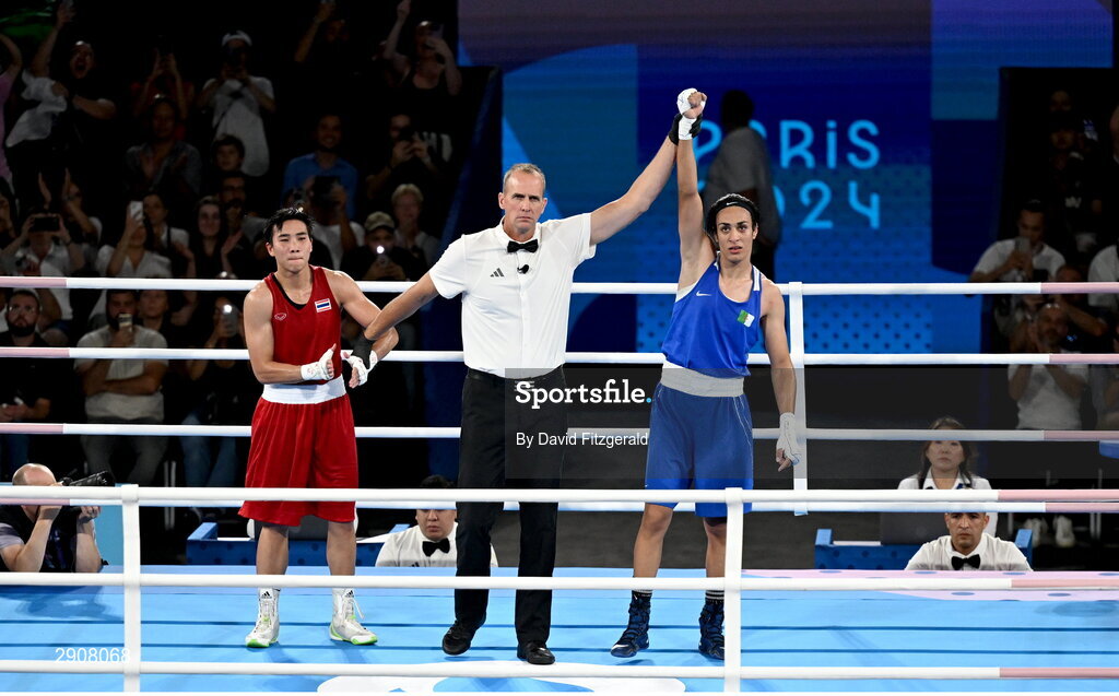 6 August 2024; Referee Shawn Reese declares Imane Khelif of Team Algeria victorious over Janjaem Suwannapheng of Team Thailand in their women's 66kg semi-final bout at Court Philippe-Chatrier in Roland Garros Stadium during the 2024 Paris Summer Olympic Games in Paris, France. Photo by David Fitzgerald/Sportsfile