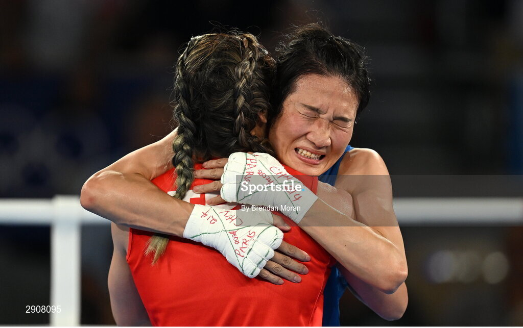 6 August 2024; Nien Chin Chen of Team Chinese Taipei, right, and Liu Yang of Team People's Republic of China embrace after their women's 66kg semi-final bout at Court Philippe-Chatrier in Roland Garros Stadium during the 2024 Paris Summer Olympic Games in Paris, France. Photo by Brendan Moran/Sportsfile