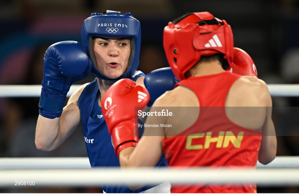 6 August 2024; Kellie Harrington of Team Ireland, left, and Wenlu Yang of Team People's Republic of China during their women's 60kg final bout at Court Philippe-Chatrier in Roland Garros Stadium during the 2024 Paris Summer Olympic Games in Paris, France. Photo by Brendan Moran/Sportsfile