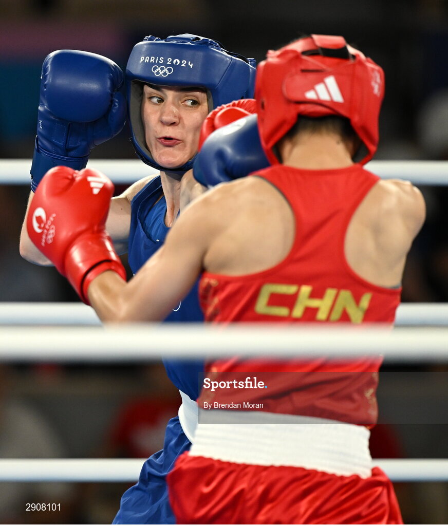 6 August 2024; Kellie Harrington of Team Ireland, left, and Wenlu Yang of Team People's Republic of China during their women's 60kg final bout at Court Philippe-Chatrier in Roland Garros Stadium during the 2024 Paris Summer Olympic Games in Paris, France. Photo by Brendan Moran/Sportsfile