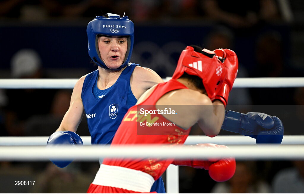 6 August 2024; Kellie Harrington of Team Ireland, left, and Wenlu Yang of Team People's Republic of China during their women's 60kg final bout at Court Philippe-Chatrier in Roland Garros Stadium during the 2024 Paris Summer Olympic Games in Paris, France. Photo by Brendan Moran/Sportsfile