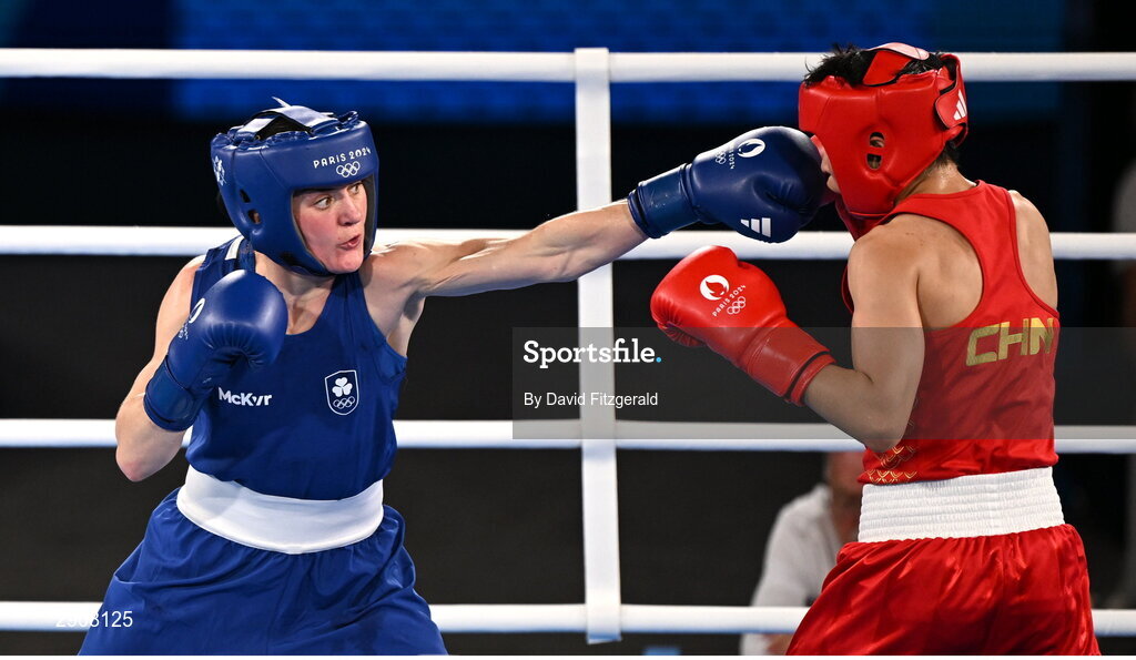 6 August 2024; Kellie Harrington of Team Ireland, above, and Wenlu Yang of Team People's Republic of China during their women's 60kg final bout at Court Philippe-Chatrier in Roland Garros Stadium during the 2024 Paris Summer Olympic Games in Paris, France. Photo by David Fitzgerald/Sportsfile