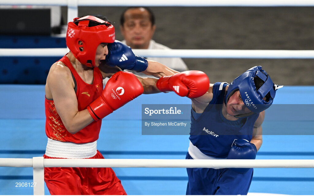 6 August 2024; Kellie Harrington of Team Ireland, right, and Wenlu Yang of Team People's Republic of China during their women's 60kg final bout at Court Philippe-Chatrier in Roland Garros Stadium during the 2024 Paris Summer Olympic Games in Paris, France. Photo by Stephen McCarthy/Sportsfile
