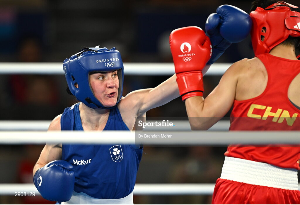 6 August 2024; Kellie Harrington of Team Ireland, left, and Wenlu Yang of Team People's Republic of China during their women's 60kg final bout at Court Philippe-Chatrier in Roland Garros Stadium during the 2024 Paris Summer Olympic Games in Paris, France. Photo by Brendan Moran/Sportsfile