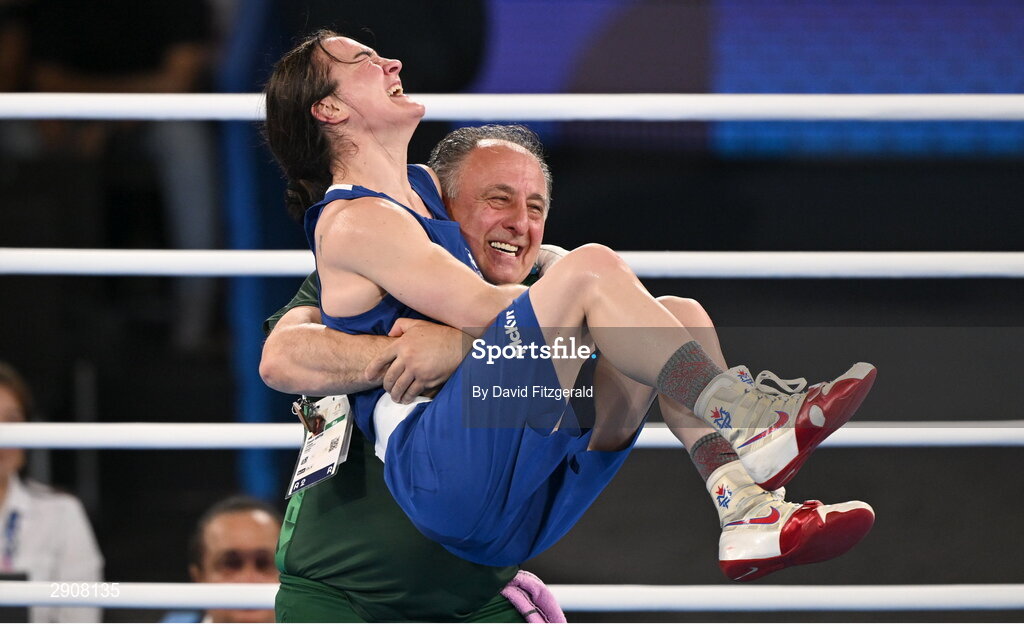 6 August 2024; Kellie Harrington of Team Ireland celebrates with head coach Zaur Antia after defeating Wenlu Yang of Team People's Republic of China in their women's 60kg final bout at Court Philippe-Chatrier in Roland Garros Stadium during the 2024 Paris Summer Olympic Games in Paris, France. Photo by David Fitzgerald/Sportsfile