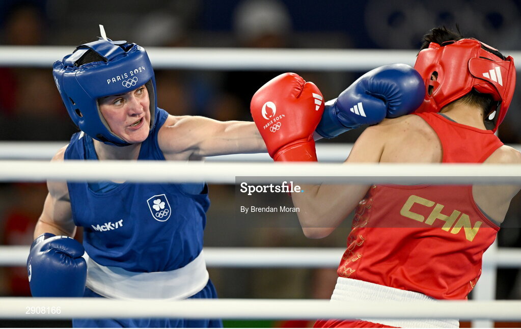 6 August 2024; Kellie Harrington of Team Ireland, left, and Wenlu Yang of Team People's Republic of China during their women's 60kg final bout at Court Philippe-Chatrier in Roland Garros Stadium during the 2024 Paris Summer Olympic Games in Paris, France. Photo by Brendan Moran/Sportsfile