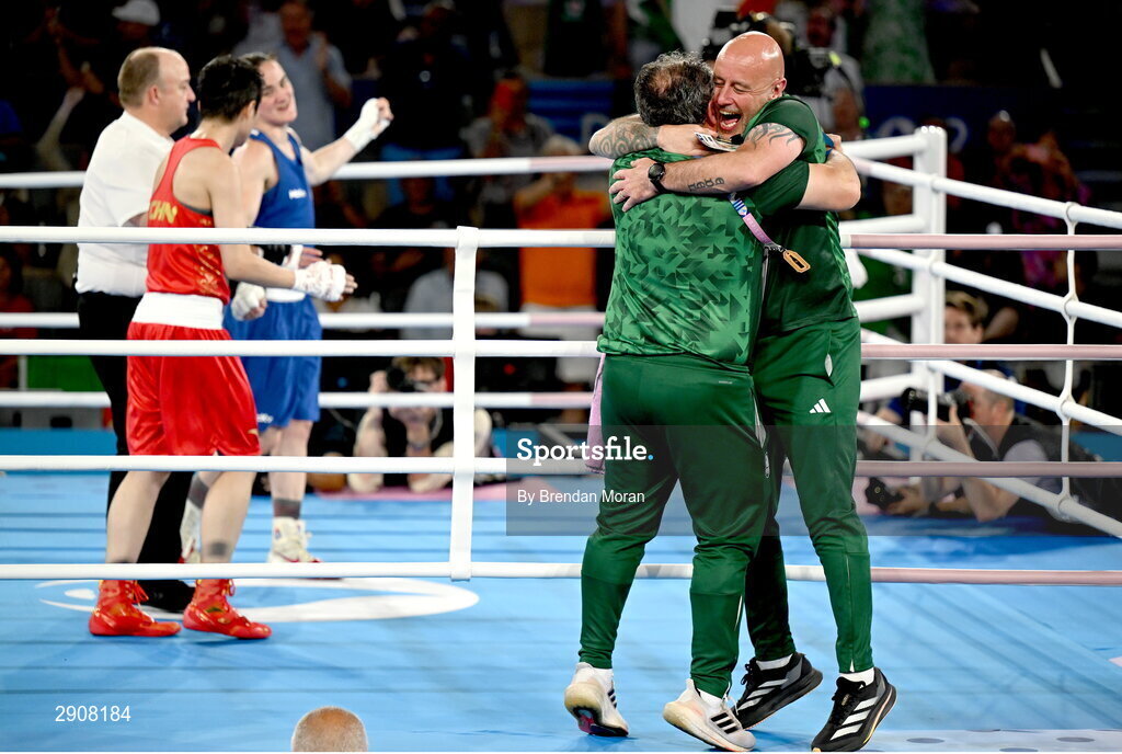6 August 2024; Zaur Antia and Damian Kennedy, coaches to Kellie Harrington of Team Ireland celebrate as she is declared victorious overWenlu Yang of Team People's Republic of China in their women's 60kg final bout at Court Philippe-Chatrier in Roland Garros Stadium during the 2024 Paris Summer Olympic Games in Paris, France. Photo by Brendan Moran/Sportsfile
