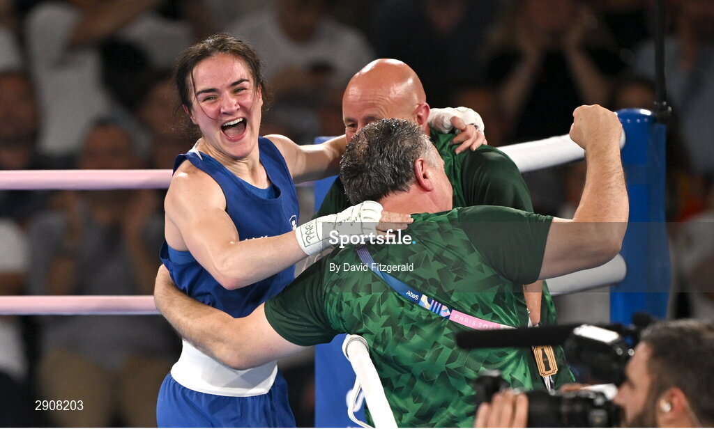 6 August 2024; Kellie Harrington of Team Ireland celebrates with coaches Zaur Antia and Damian Kennedy after defeating Wenlu Yang of Team People's Republic of China in their women's 60kg final bout at Court Philippe-Chatrier in Roland Garros Stadium during the 2024 Paris Summer Olympic Games in Paris, France. Photo by David Fitzgerald/Sportsfile