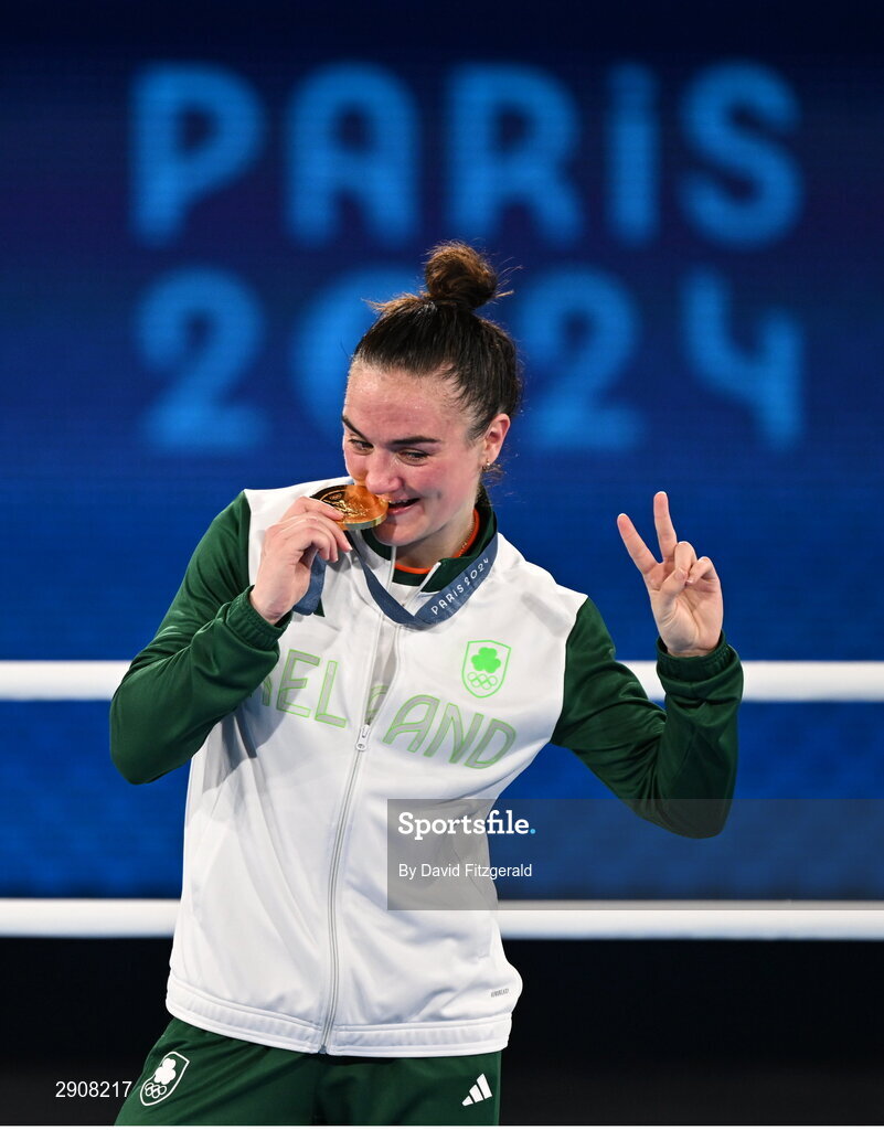 6 August 2024; Kellie Harrington of Team Ireland celebrates with her gold medal after defeating Wenlu Yang of Team People's Republic of China in their women's 60kg final bout  at Court Philippe-Chatrier in Roland Garros Stadium during the 2024 Paris Summer Olympic Games in Paris, France. Photo by David Fitzgerald/Sportsfile