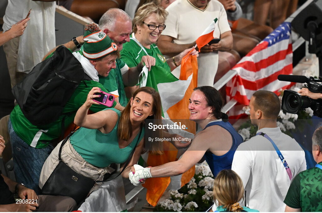 6 August 2024; Kellie Harrington of Team Ireland celebrates with supporters after defeating Wenlu Yang of Team People's Republic of China in their women's 60kg final bout at Court Philippe-Chatrier in Roland Garros Stadium during the 2024 Paris Summer Olympic Games in Paris, France. Photo by Stephen McCarthy/Sportsfile