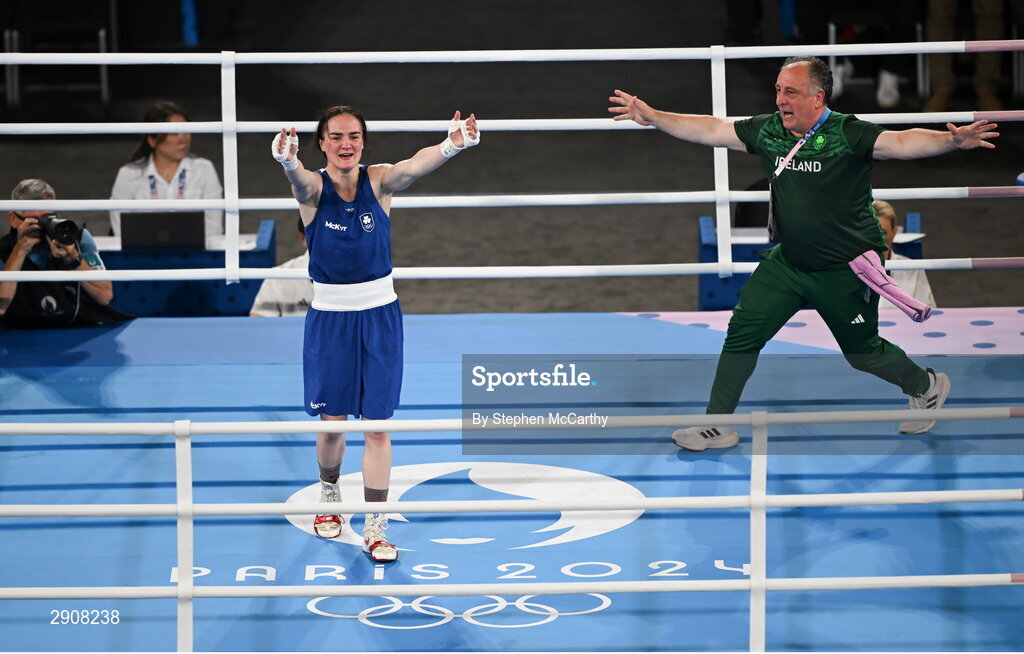 6 August 2024; Kellie Harrington of Team Ireland celebrates with head coach Zaur Antia after defeating Wenlu Yang of Team People's Republic of China in their women's 60kg final bout at Court Philippe-Chatrier in Roland Garros Stadium during the 2024 Paris Summer Olympic Games in Paris, France. Photo by Stephen McCarthy/Sportsfile