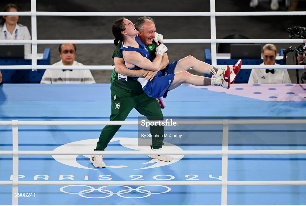 6 August 2024; Kellie Harrington of Team Ireland celebrates with head coach Zaur Antia after defeating Wenlu Yang of Team People's Republic of China in their women's 60kg final bout at Court Philippe-Chatrier in Roland Garros Stadium during the 2024 Paris Summer Olympic Games in Paris, France. Photo by Stephen McCarthy/Sportsfile
