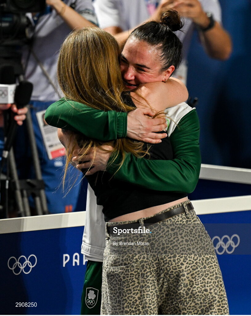 6 August 2024; Gold medalist Kellie Harrington of Team Ireland celebrates, with her wife Mandy, after defeating Wenlu Yang of Team People's Republic of China in their women's 60kg final bout  at Court Philippe-Chatrier in Roland Garros Stadium during the 2024 Paris Summer Olympic Games in Paris, France. Photo by Brendan Moran/Sportsfile