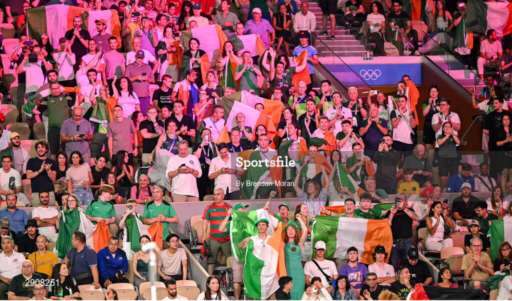 6 August 2024; Supporters of Kellie Harrington of Team Ireland celebrate her victory in her women's 60kg final bout against Wenlu Yang of Team People's Republic of China at Court Philippe-Chatrier in Roland Garros Stadium during the 2024 Paris Summer Olympic Games in Paris, France. Photo by Brendan Moran/Sportsfile