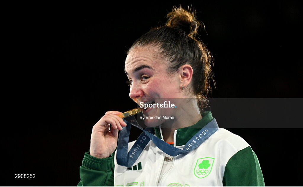 6 August 2024; Kellie Harrington of Team Ireland celebrates with her gold medal after defeating Wenlu Yang of Team People's Republic of China in their women's 60kg final bout  at Court Philippe-Chatrier in Roland Garros Stadium during the 2024 Paris Summer Olympic Games in Paris, France. Photo by Brendan Moran/Sportsfile