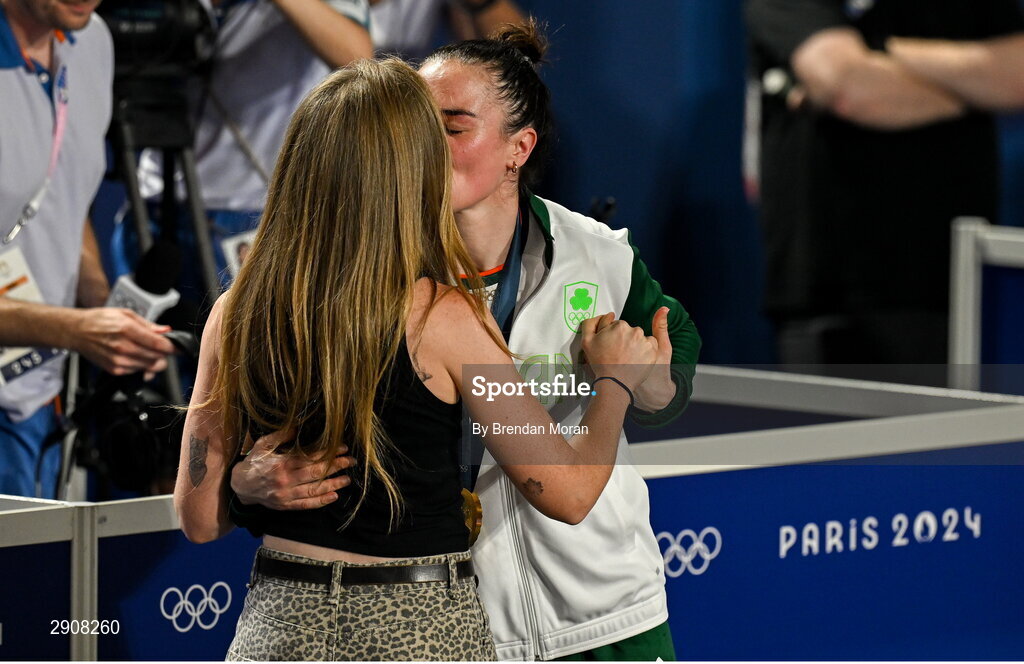 6 August 2024; Gold medalist Kellie Harrington of Team Ireland celebrates, with her wife Mandy, after defeating Wenlu Yang of Team People's Republic of China in their women's 60kg final bout  at Court Philippe-Chatrier in Roland Garros Stadium during the 2024 Paris Summer Olympic Games in Paris, France. Photo by Brendan Moran/Sportsfile