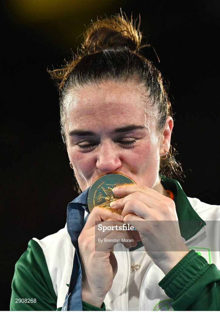 6 August 2024; Kellie Harrington of Team Ireland kisses her gold medal after defeating Wenlu Yang of Team People's Republic of China in their women's 60kg final bout  at Court Philippe-Chatrier in Roland Garros Stadium during the 2024 Paris Summer Olympic Games in Paris, France. Photo by Brendan Moran/Sportsfile