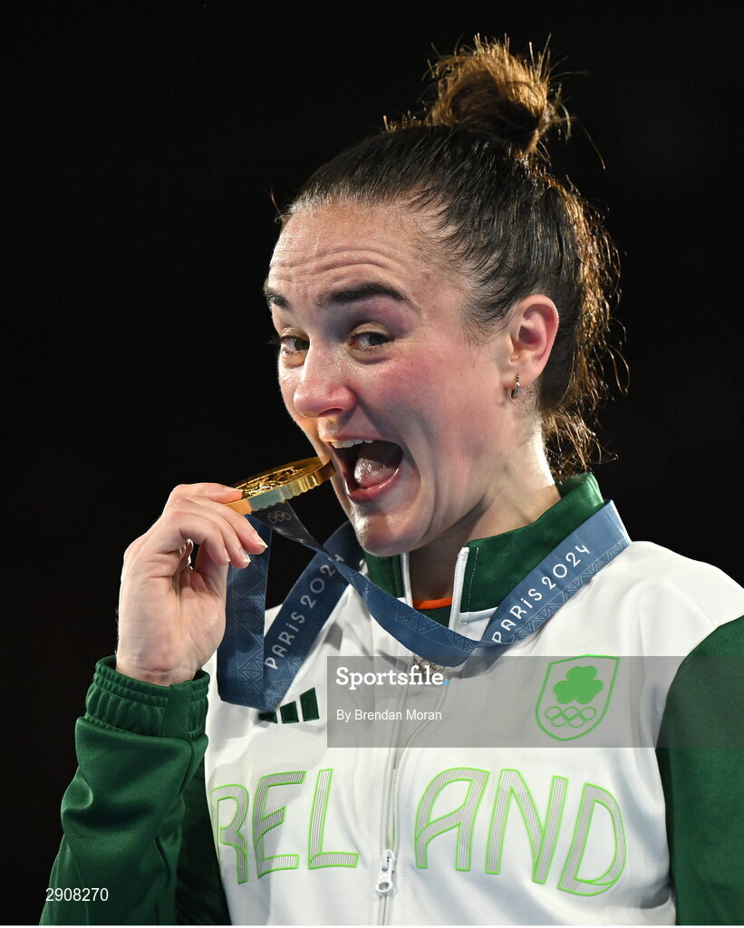 6 August 2024; Kellie Harrington of Team Ireland celebrates with her gold medal after defeating Wenlu Yang of Team People's Republic of China in their women's 60kg final bout  at Court Philippe-Chatrier in Roland Garros Stadium during the 2024 Paris Summer Olympic Games in Paris, France. Photo by Brendan Moran/Sportsfile