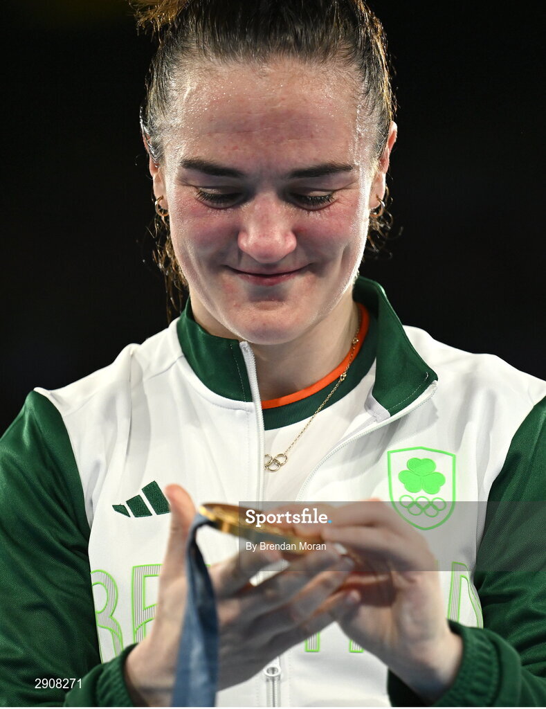 6 August 2024; Kellie Harrington of Team Ireland celebrates with her gold medal after defeating Wenlu Yang of Team People's Republic of China in their women's 60kg final bout  at Court Philippe-Chatrier in Roland Garros Stadium during the 2024 Paris Summer Olympic Games in Paris, France. Photo by Brendan Moran/Sportsfile