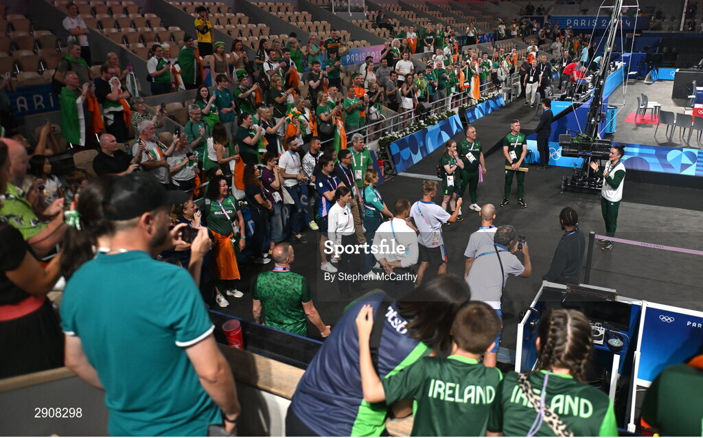 6 August 2024; Kellie Harrington of Team Ireland, right, speaks to the supporters after defeating Wenlu Yang of Team People's Republic of China during their women's 60kg final boutat Court Philippe-Chatrier in Roland Garros Stadium during the 2024 Paris Summer Olympic Games in Paris, France. Photo by Stephen McCarthy/Sportsfile