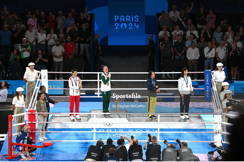 6 August 2024; Women's 60kg medallists, from left, silver medallist Wenlu Yang of Team Peoples's Republic of China, gold medallist Kellie Harrington of Team Ireland, and bronze medallists Beatriz Soares Ferreira of Team Brazil and Shih Yi Wu of Team Chinese Taipei during the medal presentation at Court Philippe-Chatrier in Roland Garros Stadium during the 2024 Paris Summer Olympic Games in Paris, France. Photo by Stephen McCarthy/Sportsfile