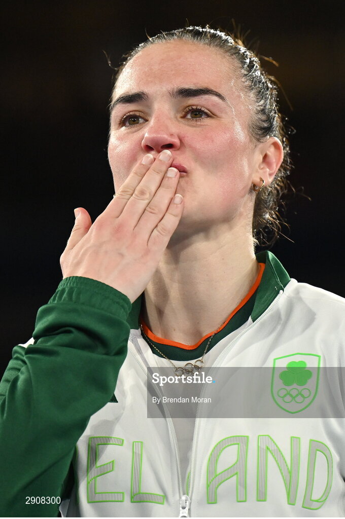 6 August 2024; Gold medalist Kellie Harrington of Team Ireland on the podium after defeating Wenlu Yang of Team People's Republic of China in their women's 60kg final bout  at Court Philippe-Chatrier in Roland Garros Stadium during the 2024 Paris Summer Olympic Games in Paris, France. Photo by Brendan Moran/Sportsfile