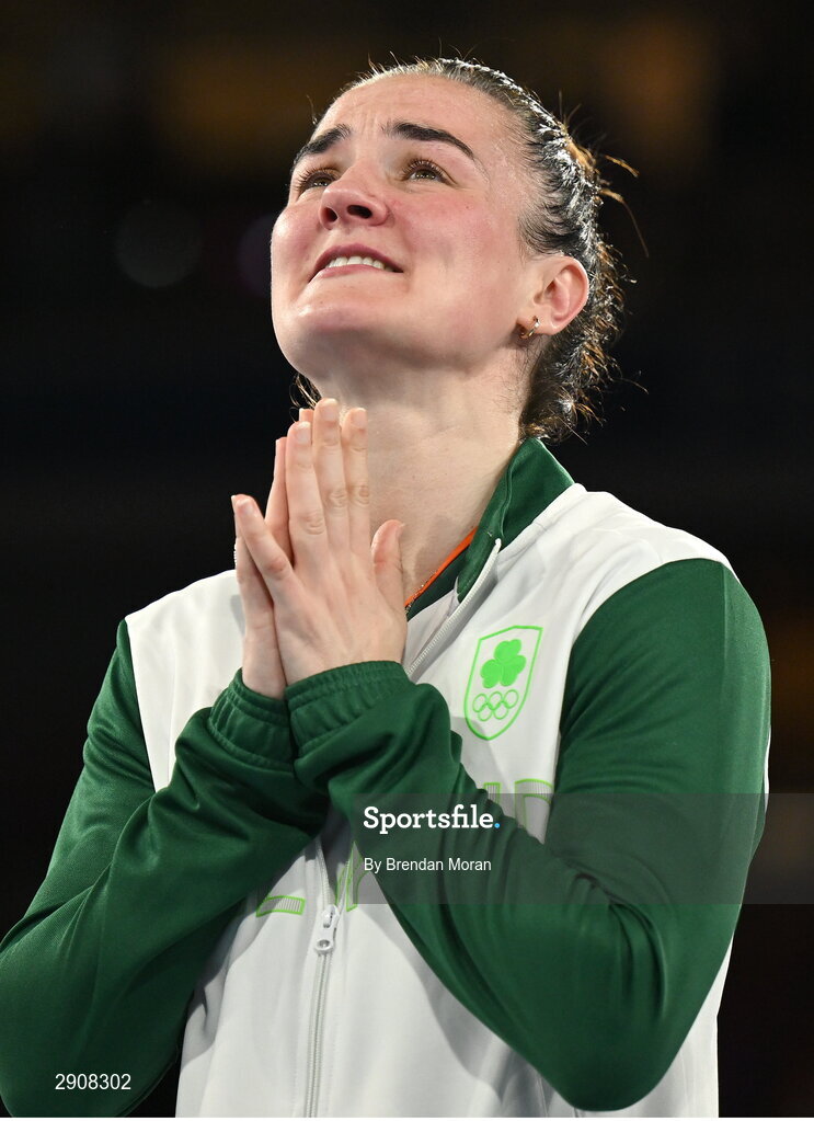 6 August 2024; Gold medalist Kellie Harrington of Team Ireland on the podium after defeating Wenlu Yang of Team People's Republic of China in their women's 60kg final bout  at Court Philippe-Chatrier in Roland Garros Stadium during the 2024 Paris Summer Olympic Games in Paris, France. Photo by Brendan Moran/Sportsfile