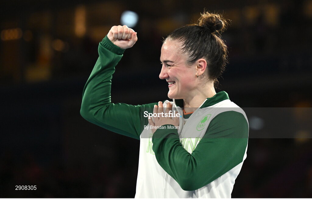 6 August 2024; Gold medalist Kellie Harrington of Team Ireland on the podium after defeating Wenlu Yang of Team People's Republic of China in their women's 60kg final bout  at Court Philippe-Chatrier in Roland Garros Stadium during the 2024 Paris Summer Olympic Games in Paris, France. Photo by Brendan Moran/Sportsfile